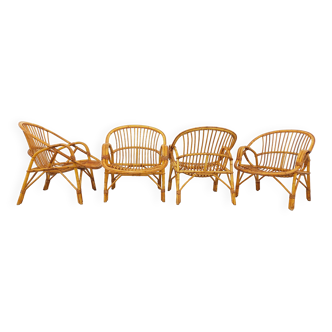 Set of 4 vintage rattan armchairs from the 60s