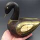 Wooden and brass swan