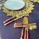 Wood and brass fish service