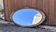 Vintage oval mirror – Patinated gold floral decorative frame