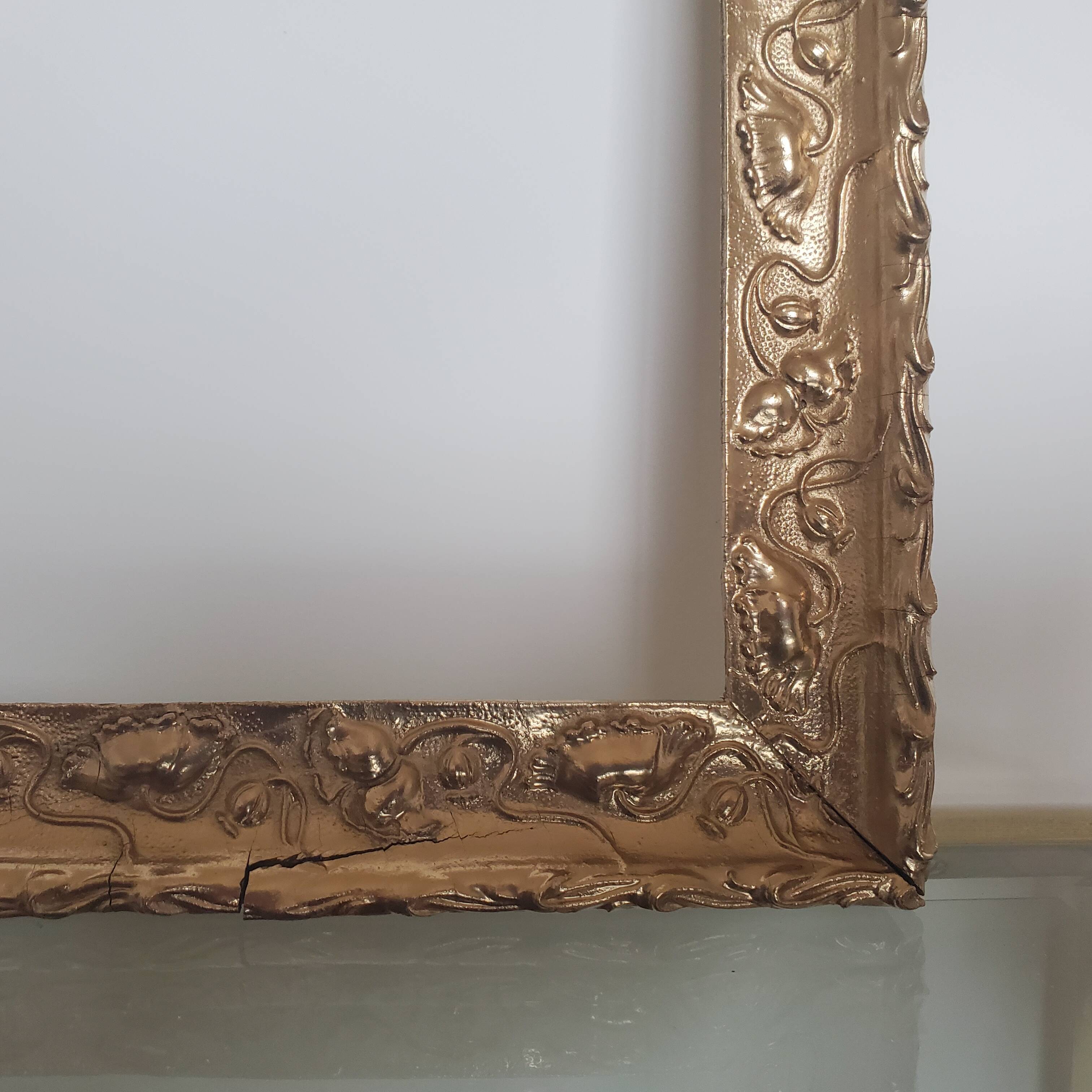 Large old gilded wooden frame