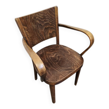 Curved wooden armchair from the 1930s