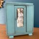 Old doll wardrobe