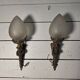 Pair of torch wall lights in Louis XVI style in 19th-century bronze.