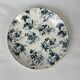 White porcelain cup with blue flowers