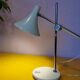 Articulated lamp in white lacquered steel and chrome, 1970.