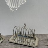 Flat silver metal tray with duck and toast