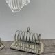 Flat silver metal tray with duck and toast