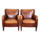 Set of 2 subtle sheepskin leather armchairs with a beautiful warm color scheme