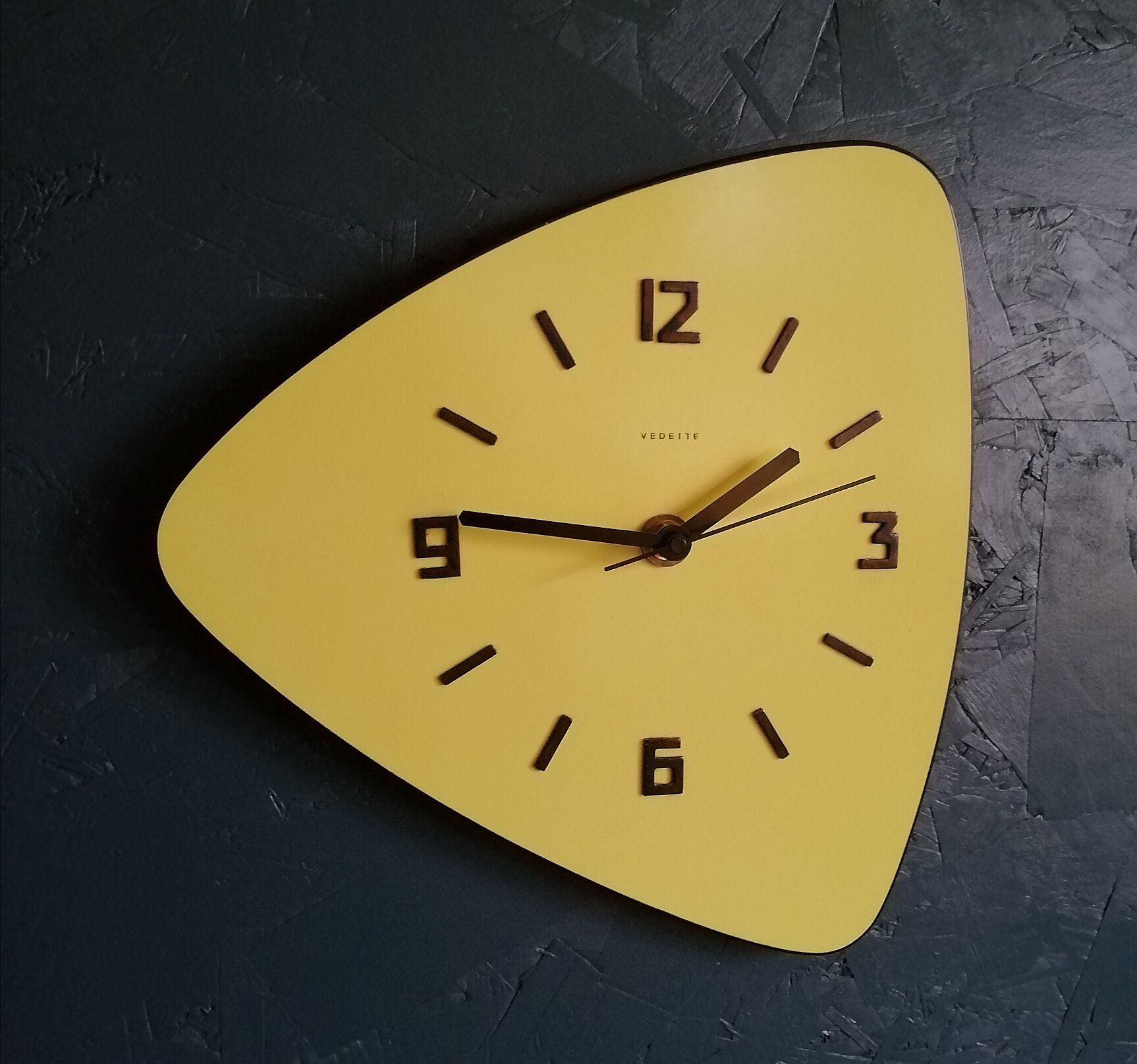 Formica vintage asymmetrical silent wall clock "Yellow Star"