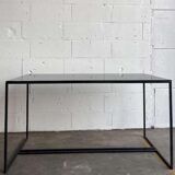 Coffee table in glass and iron