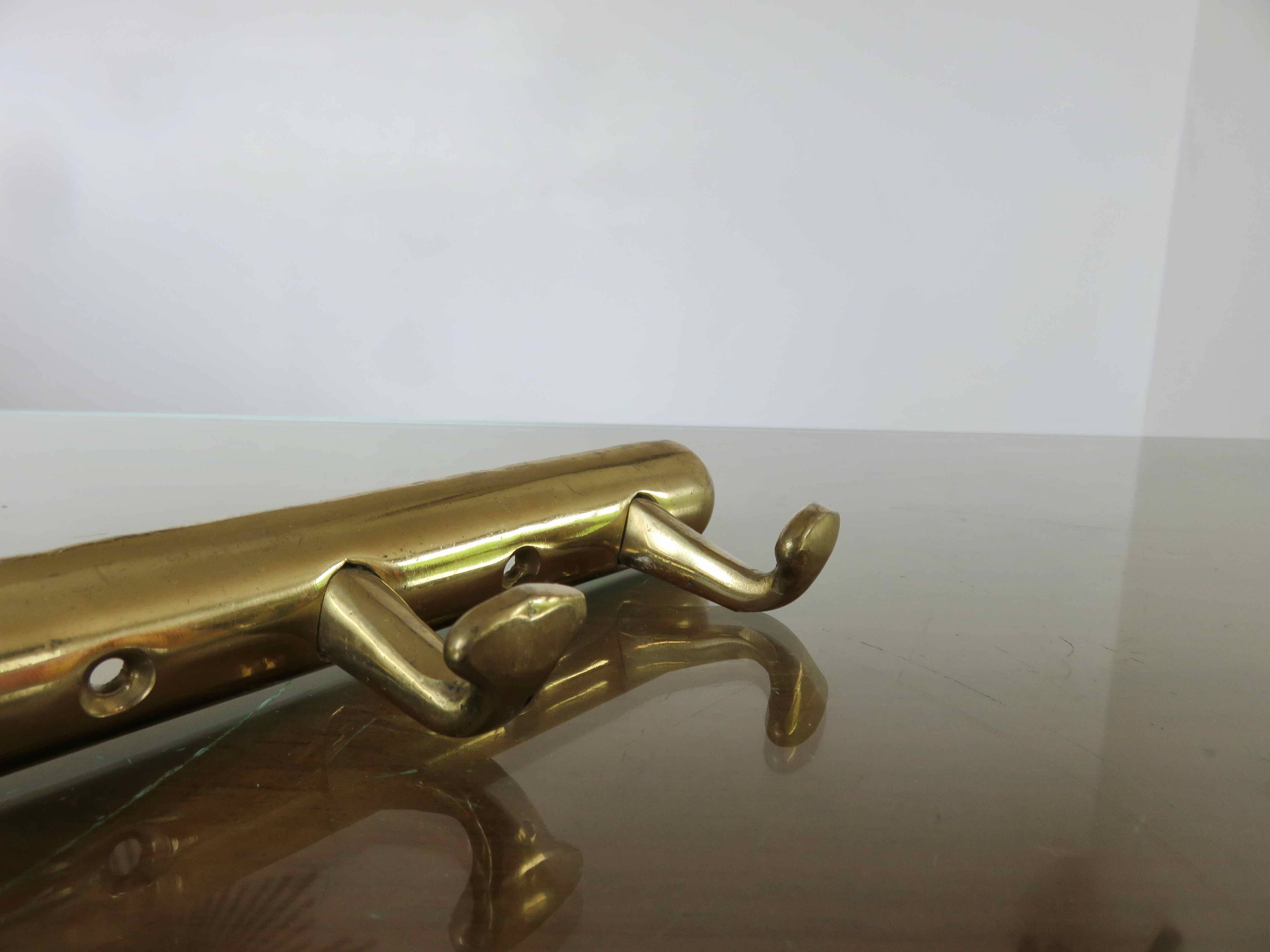 Brass tea towel holder