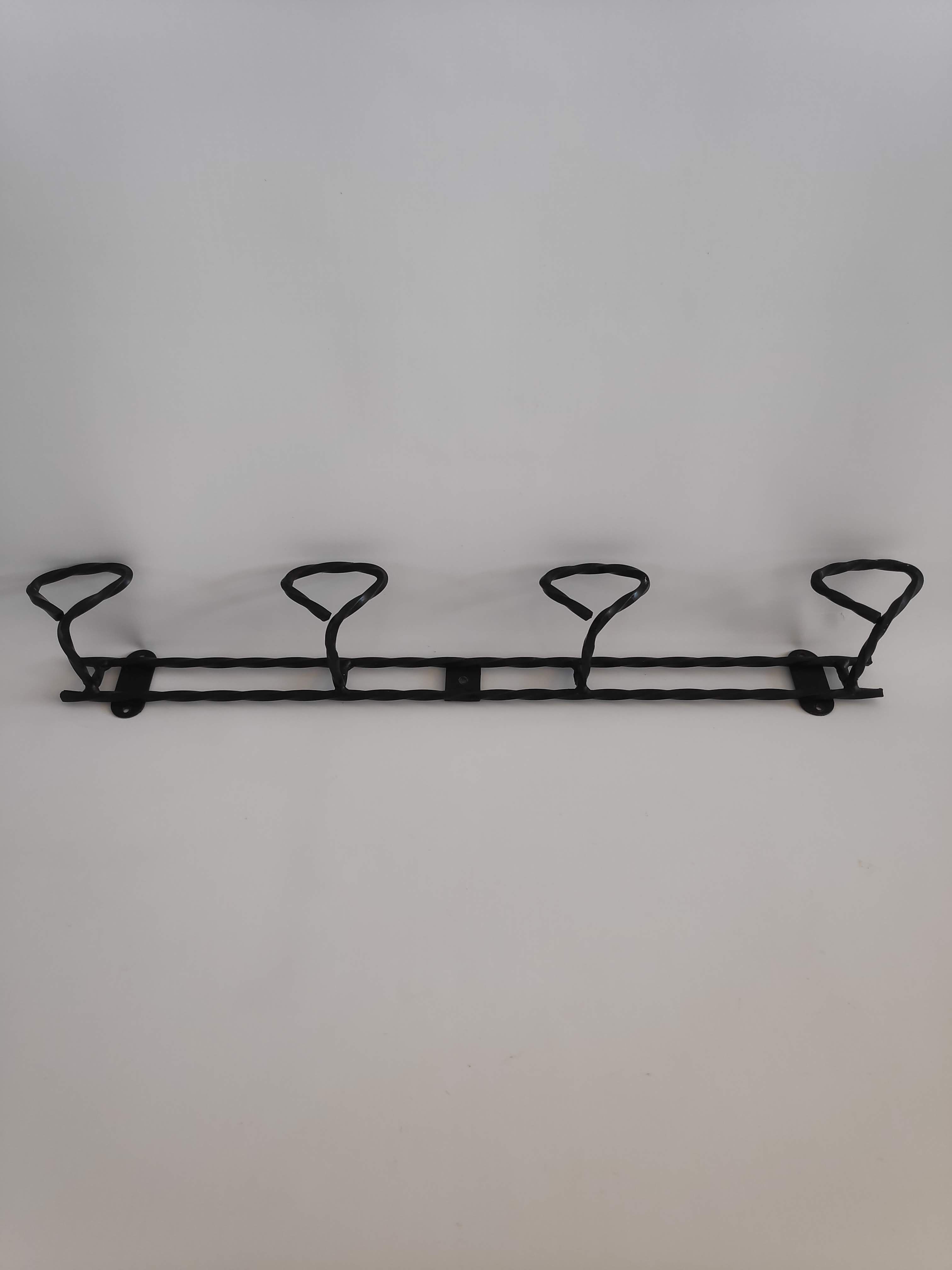 Wall door with 4 twisted metal pads from the 1950s