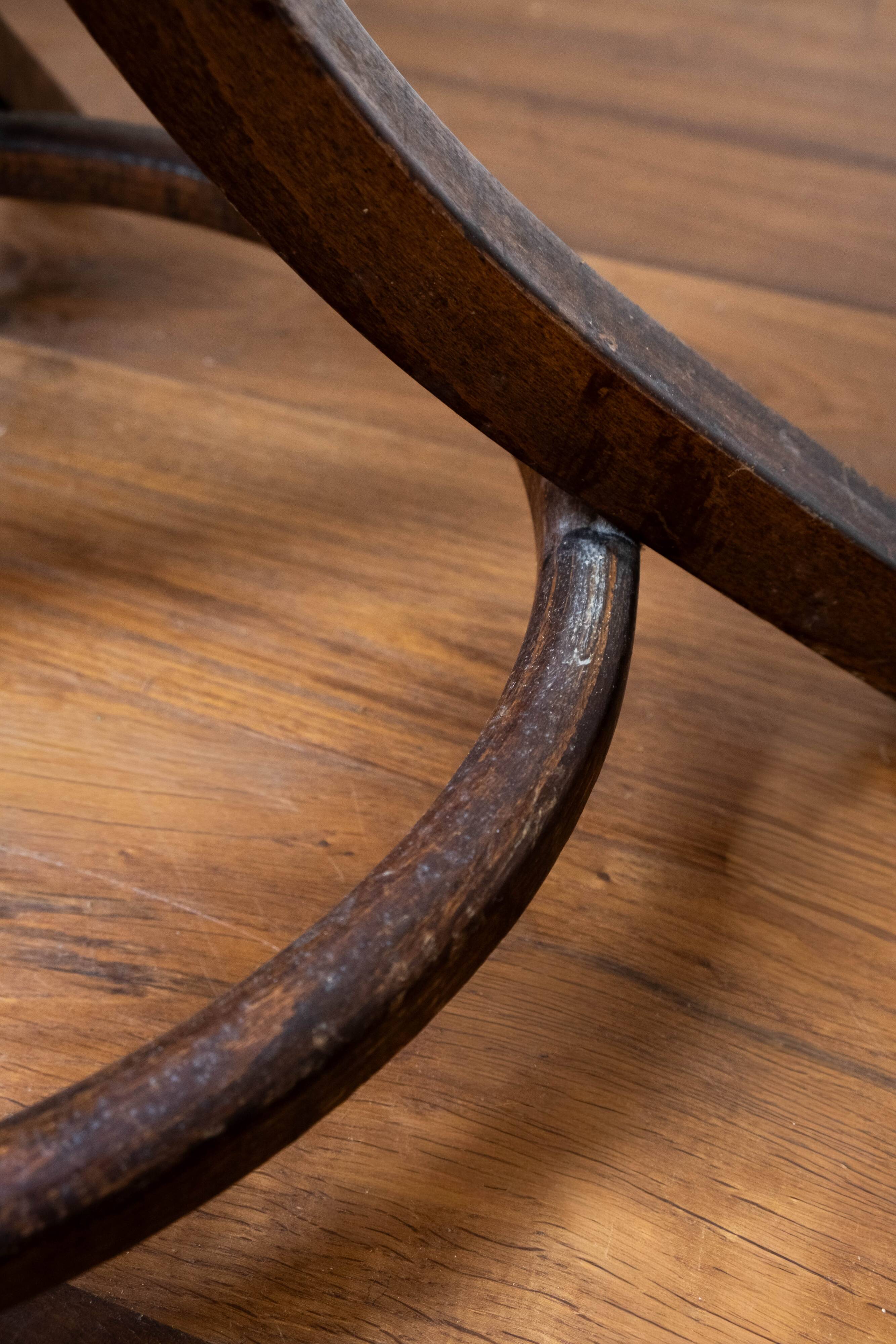 Baumann swivel parrot coat rack, dark wood.