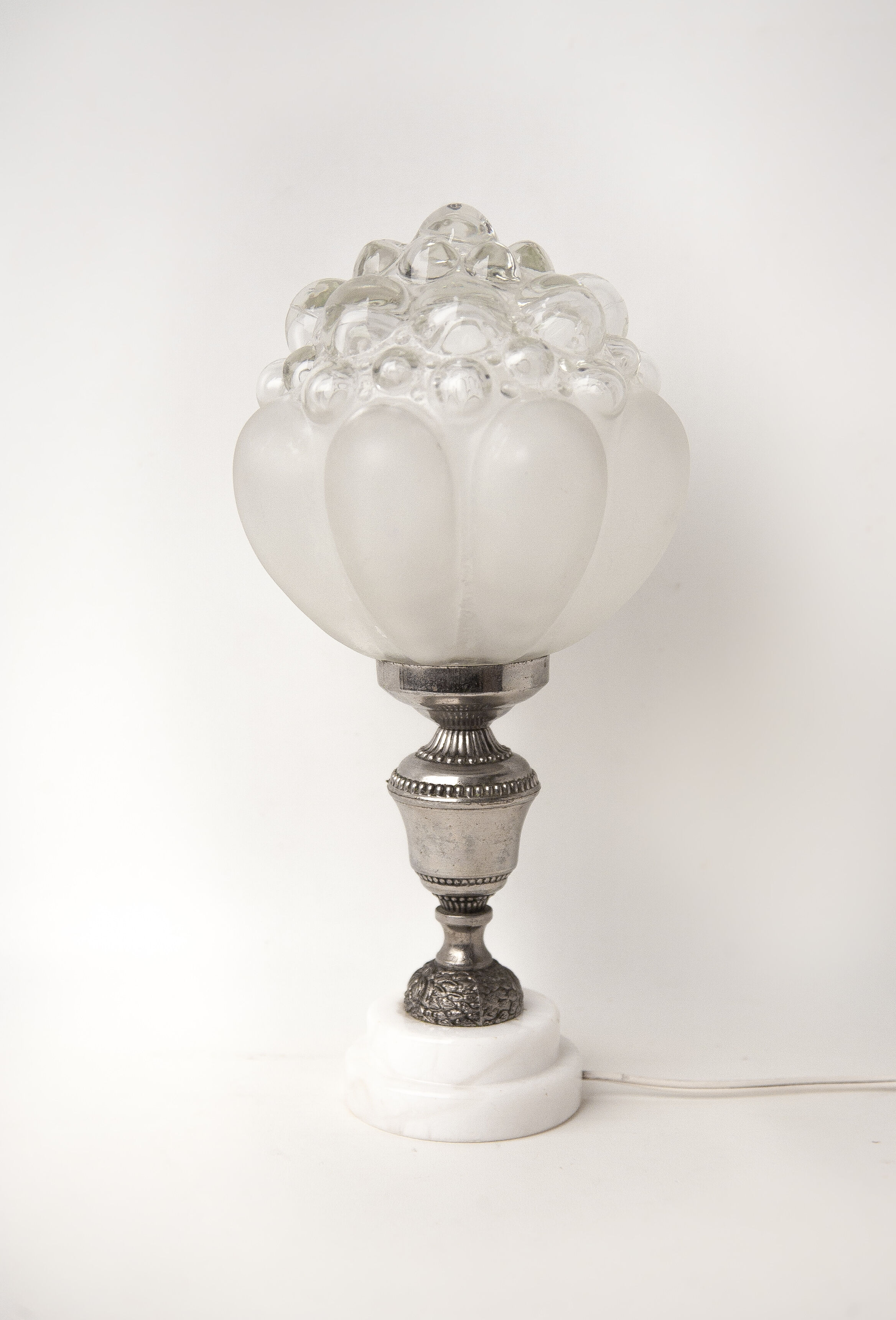 Bedside lamp in moulded glass