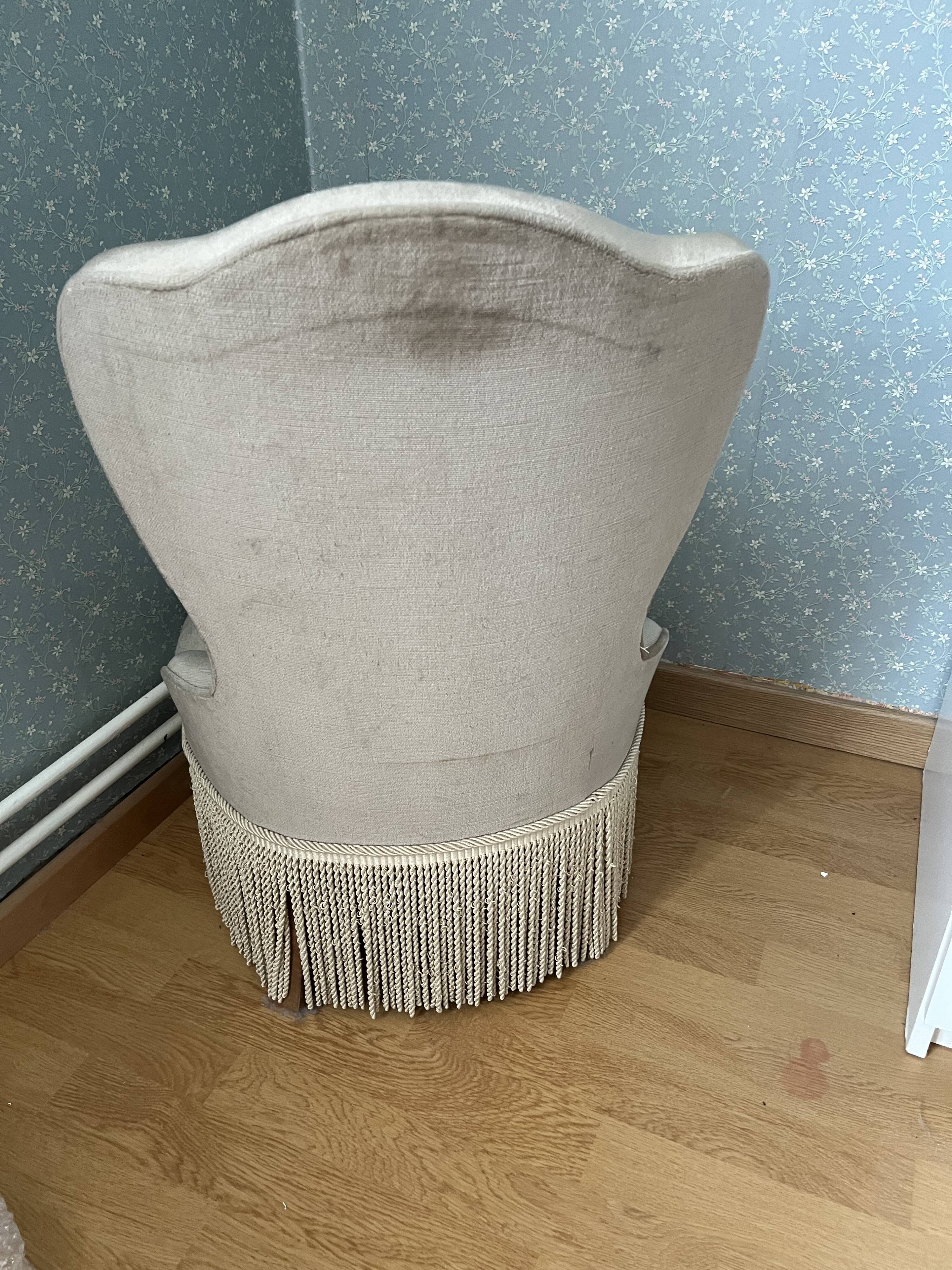 beige toadstool armchair