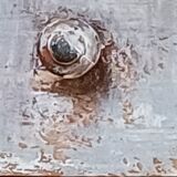 Antique piece of furniture with a grey patina.