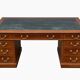Antique English walnut chest of drawers from the 1930s.