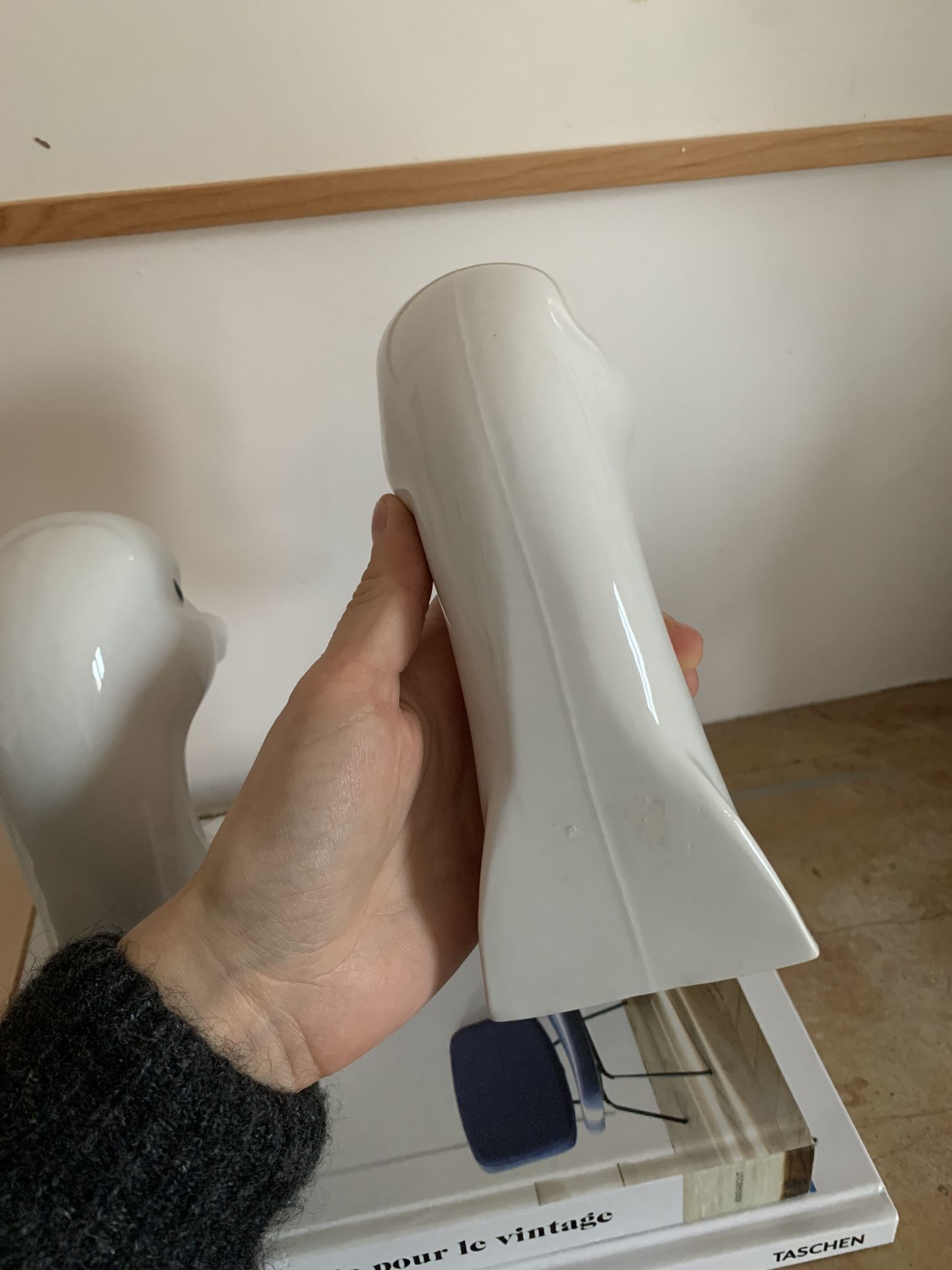 Vintage bookends in the shape of a goose or ceramic duck