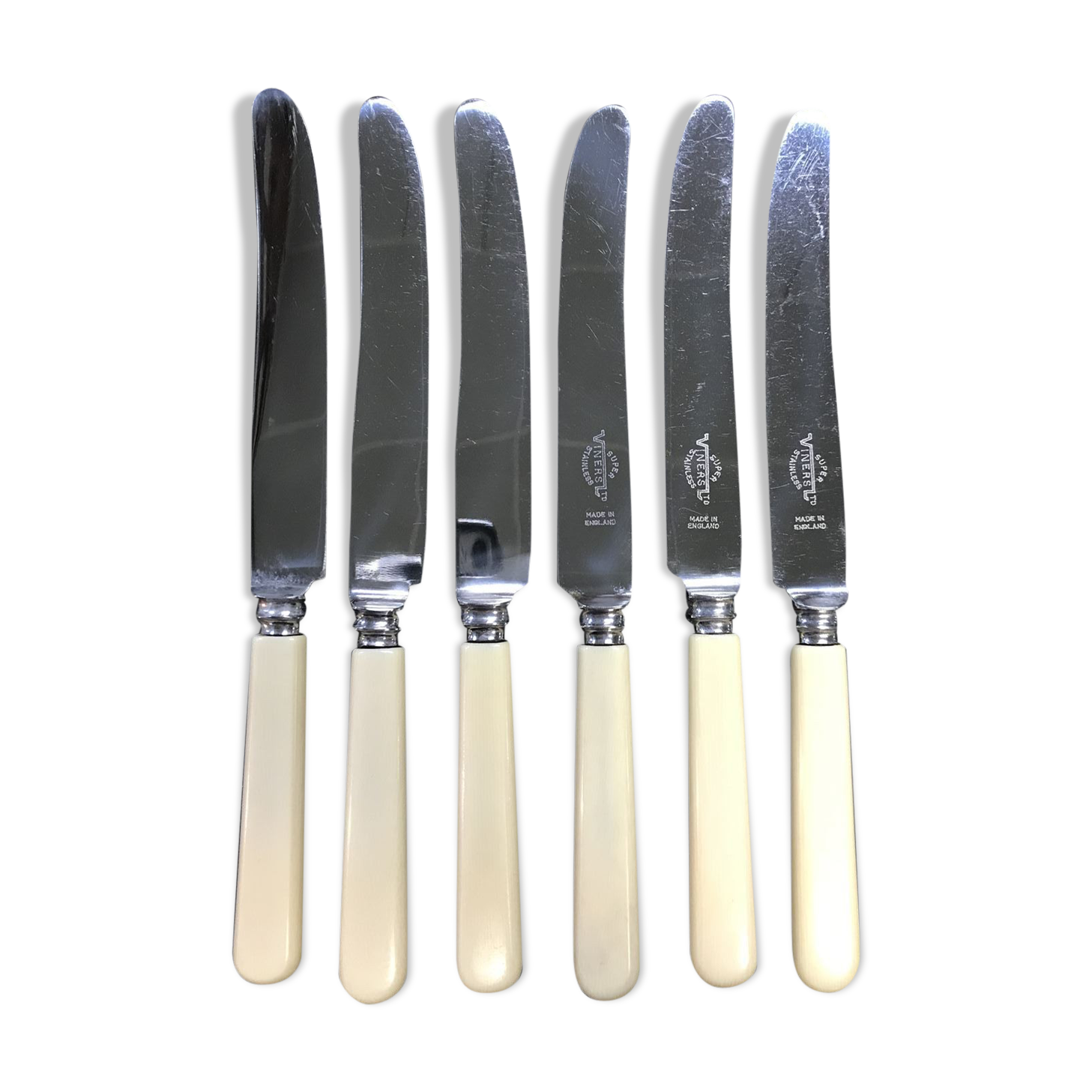 Set of 6 English knives in silver and Bakelite metal