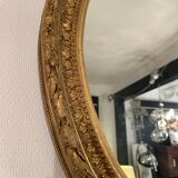 Old oval mirror, period XIXth