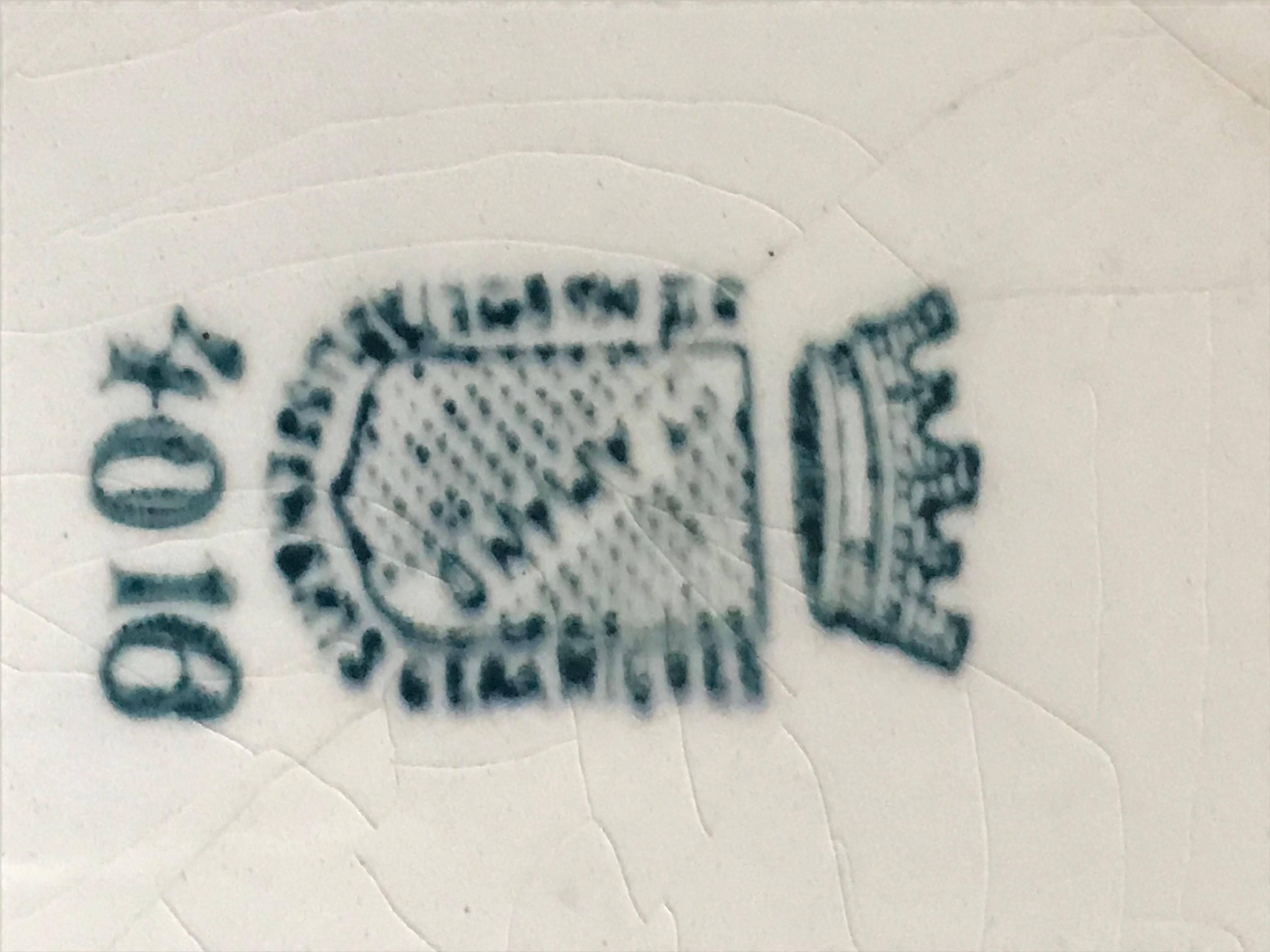 Ten old St Amand plates