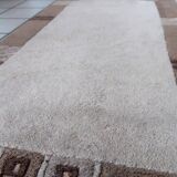 Tapis vintage tibétain Khaden fait main en laine – 64 x 124 cm  Années 1970