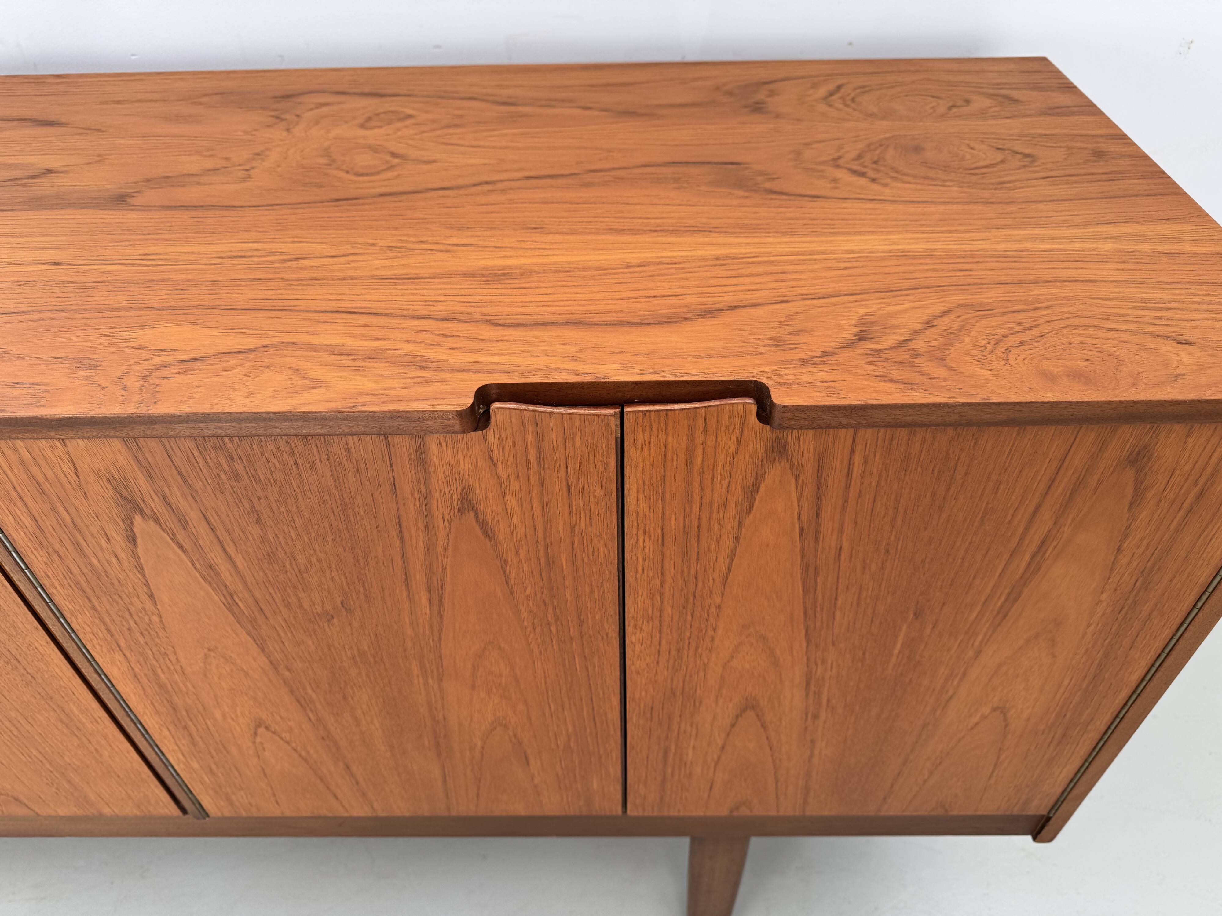 Unique vintage teak sideboard from the 1960s, produced by Nathan in the UK.