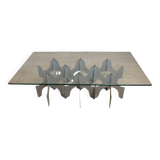 Minimalist sculptural coffee table in metal and glass