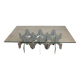 Minimalist sculptural coffee table in metal and glass