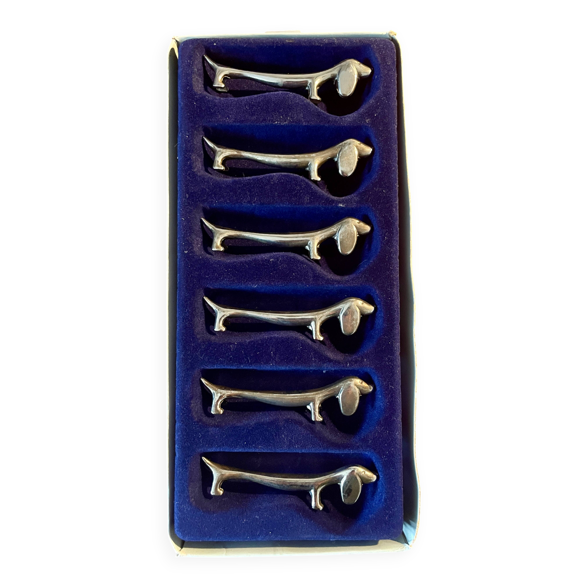Porte couteaux teckel en métal argenté