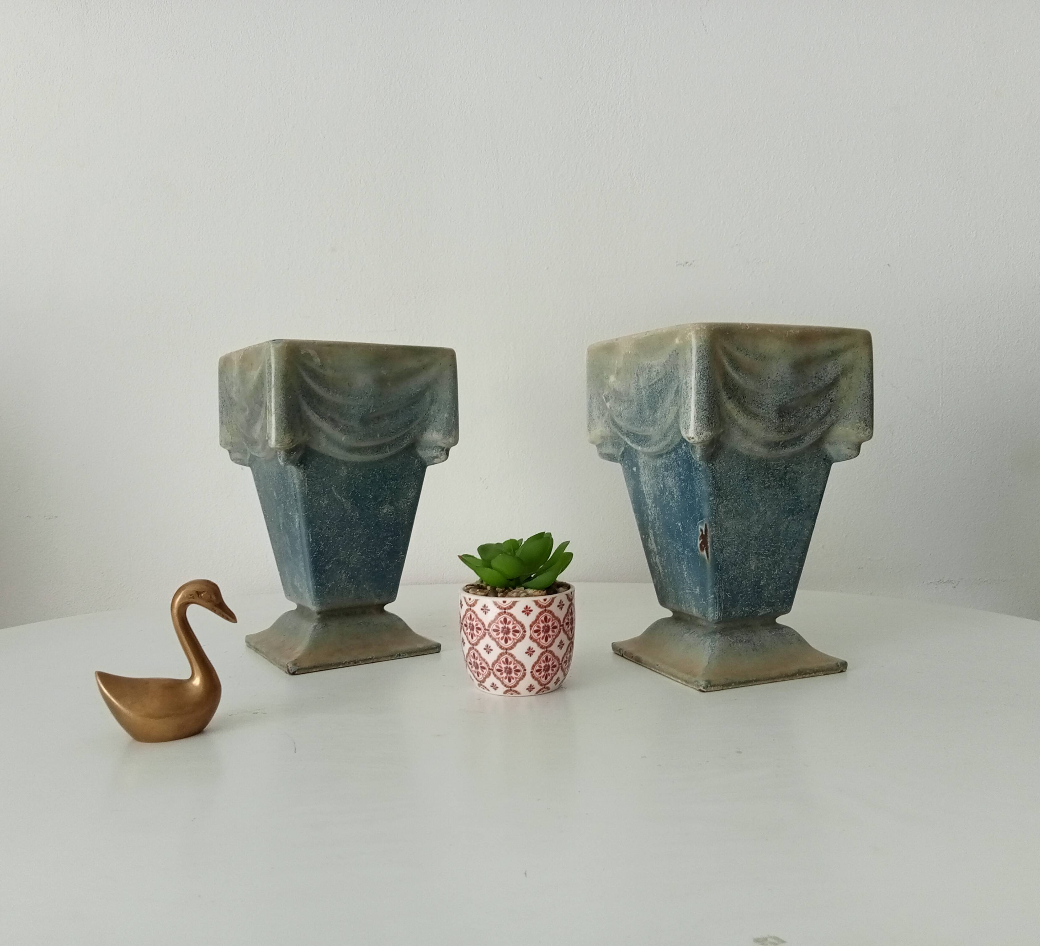 Pair of old art deco vases in enameled cast iron