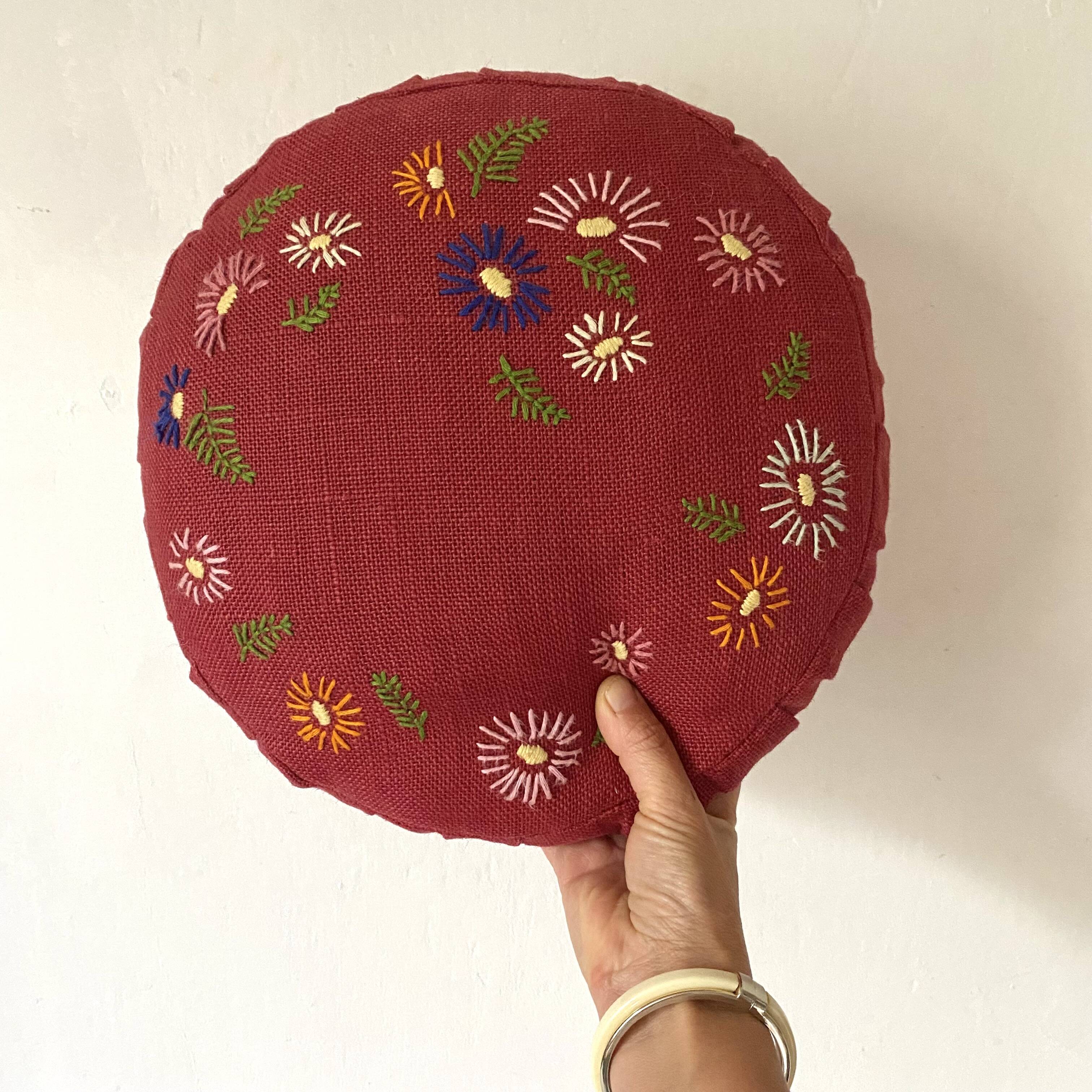 Paire de coussins ronds vintage en lin brodé