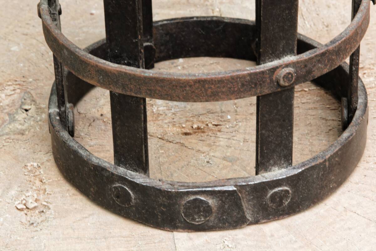 Riveted wrought iron cage suspension