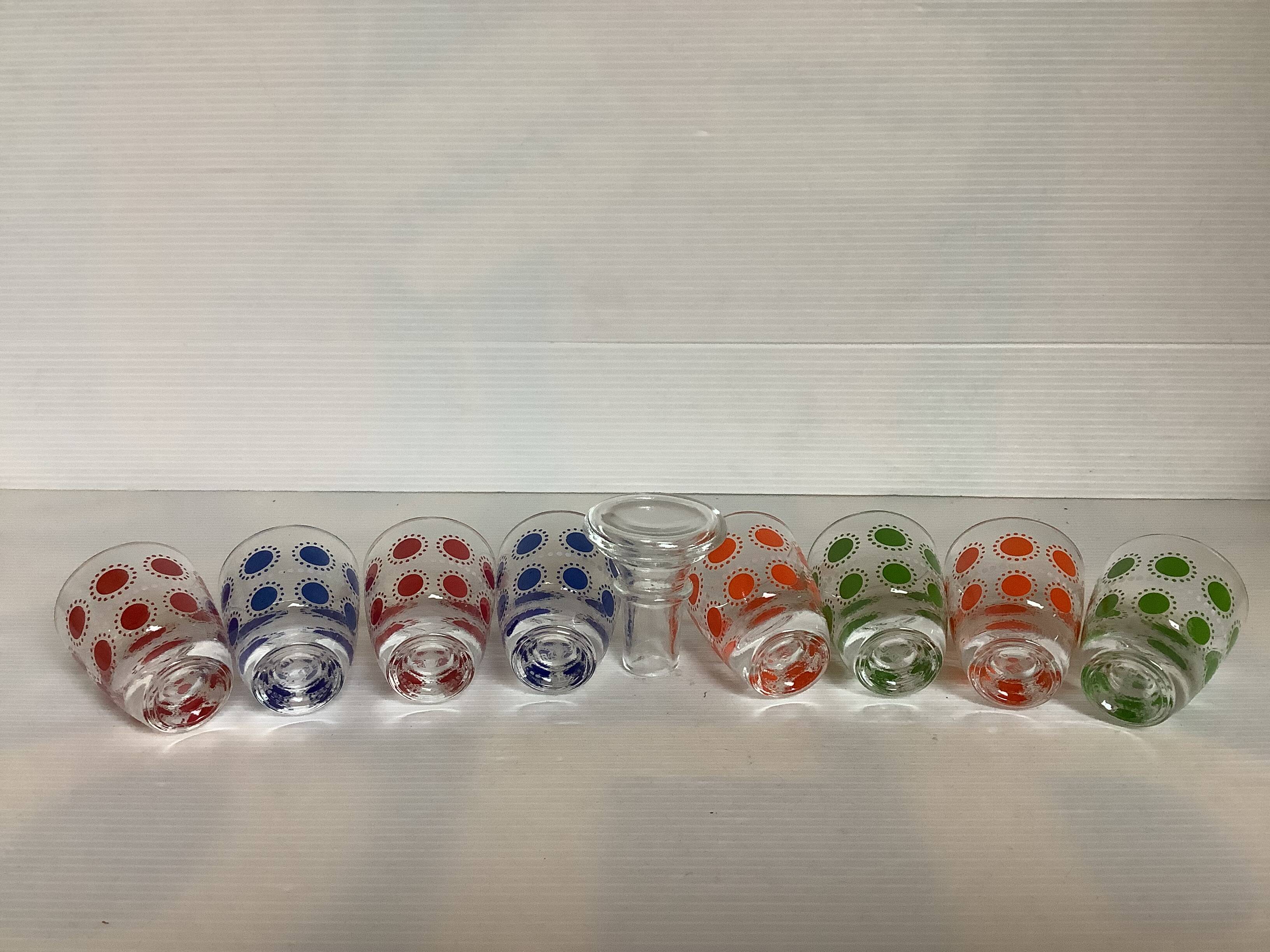 Liqueur service with multicoloured polka dot patterns.
