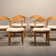 Henning Kjærnulf dining chairs set in Oak and Sheepskin, Denmark, 1960s