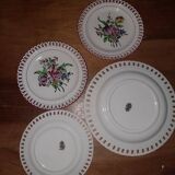 7 openwork plates and the Lunéville earthenware cake dish known as “semi Luneville porcelain”.