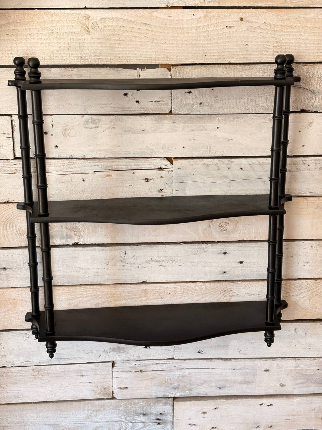 Blackened Napoleon shelf