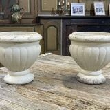 Pair of reconstituted stone planters from the 1970s.