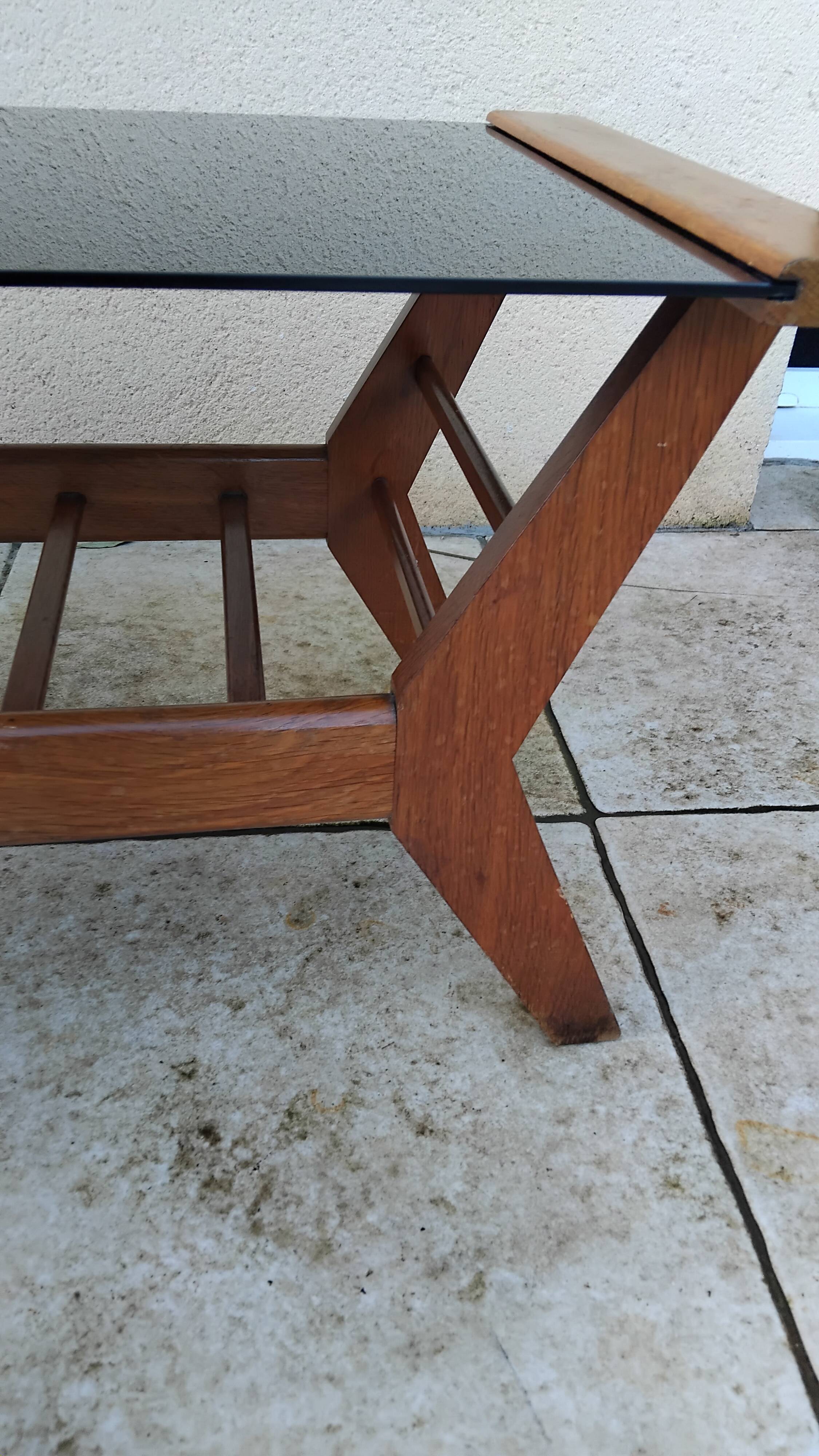 Vintage coffee table from the 1950s reconstruction, wood and glass.