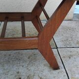 Vintage coffee table from the 1950s reconstruction, wood and glass.