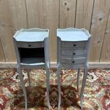 Pair of white Louis XV style bedside tables.