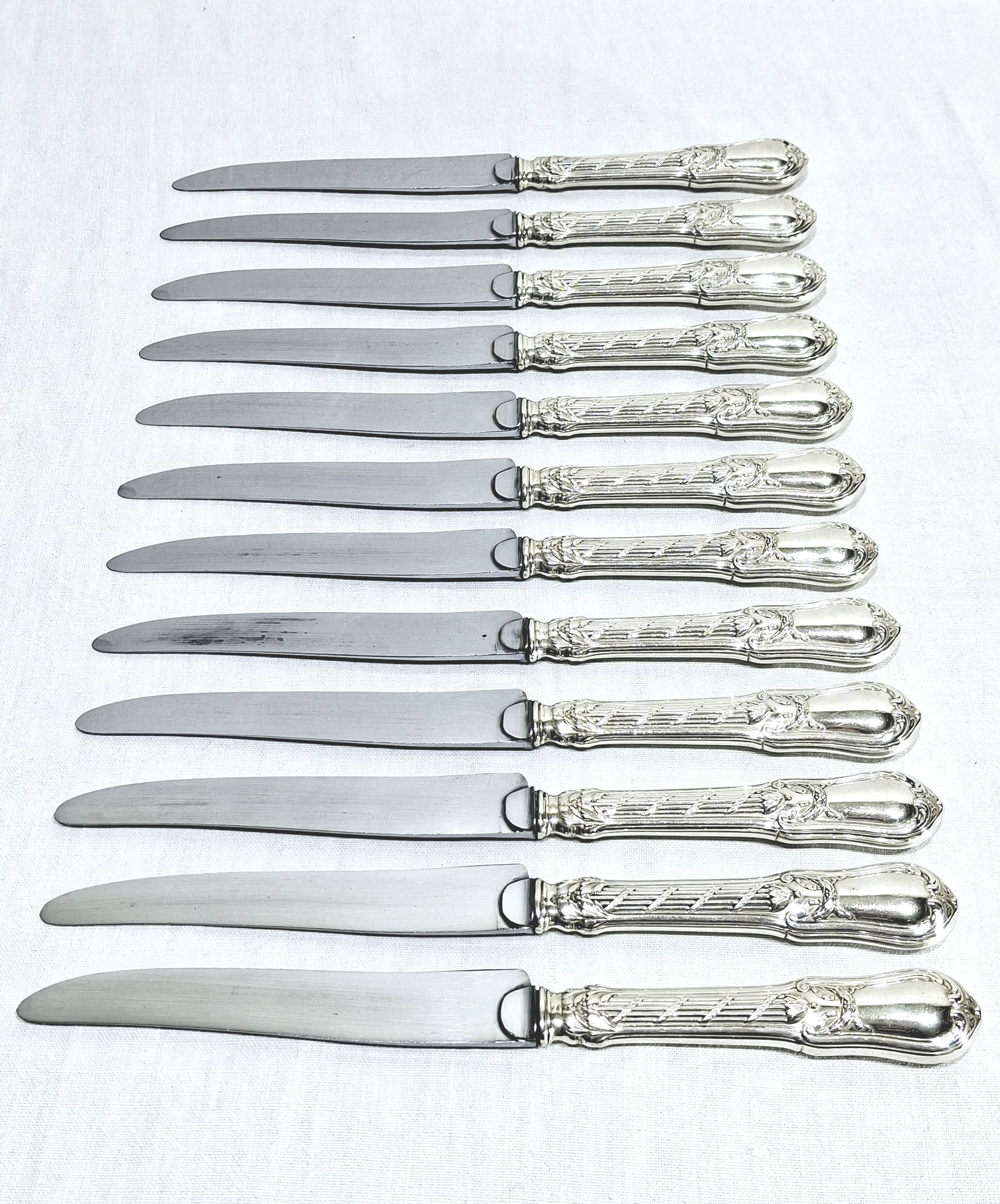 MARTIAL GAUTHIER / GEORGES FLAKENBERG - 12 KNIVES WITH SILVER HANDLES