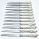 MARTIAL GAUTHIER / GEORGES FLAKENBERG - 12 KNIVES WITH SILVER HANDLES