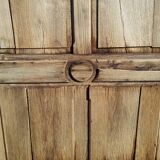 Oak door with clover-shaped oculus