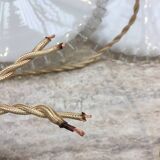 Pair of pendants in white opaline and transparent serrated edges