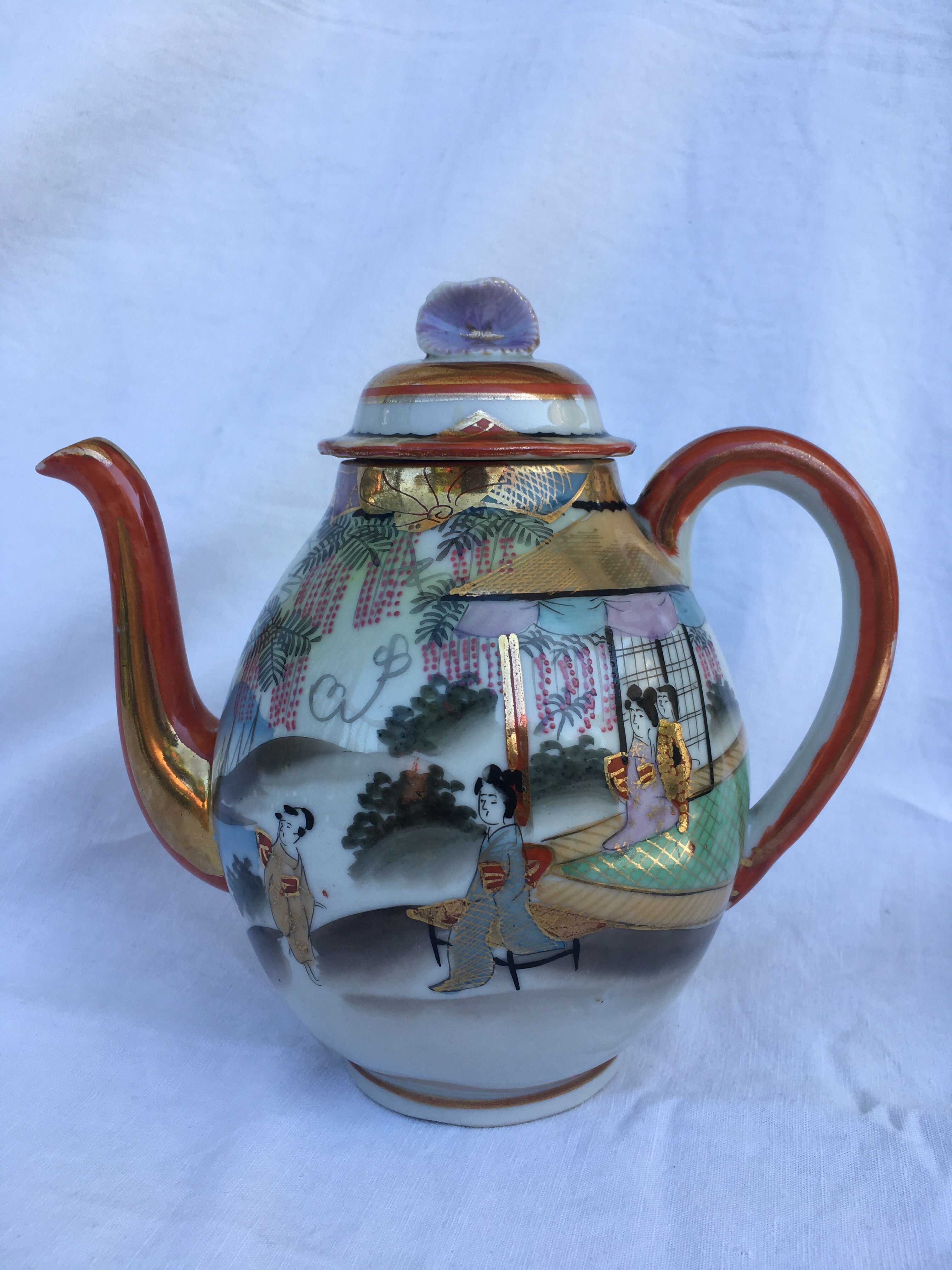 Porcelain teapot with Japanese decoration