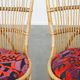 Set of 4 subtle and charming vintage 60s rattan boho chairs with colorful upholstered seats