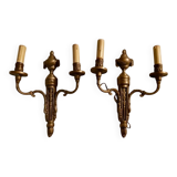 Pair of Louis XVI style neoclassical wall sconces in gilt bronze