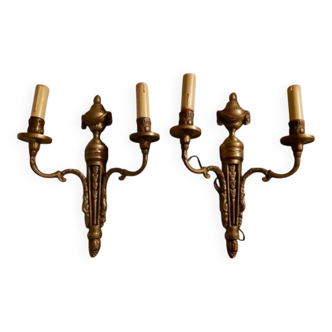 Pair of Louis XVI style neoclassical wall sconces in gilt bronze